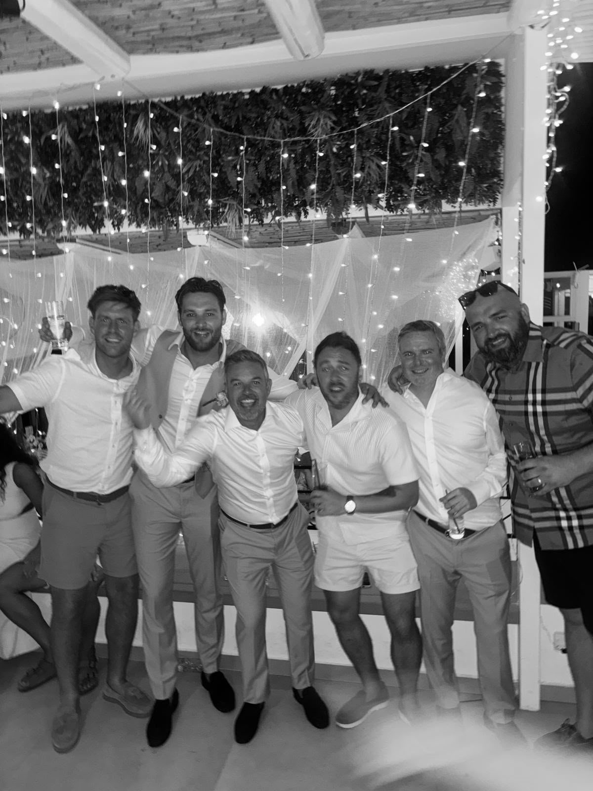 A group of men laughing together